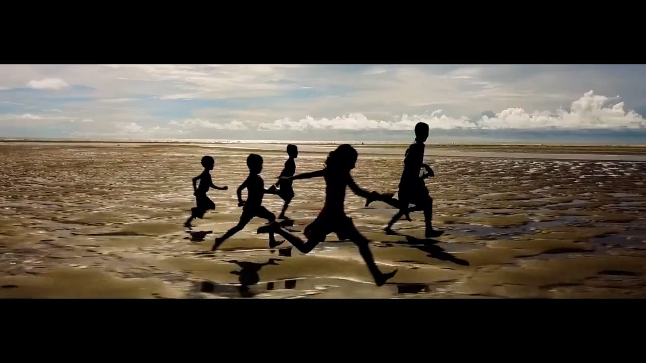 Kids running on beach